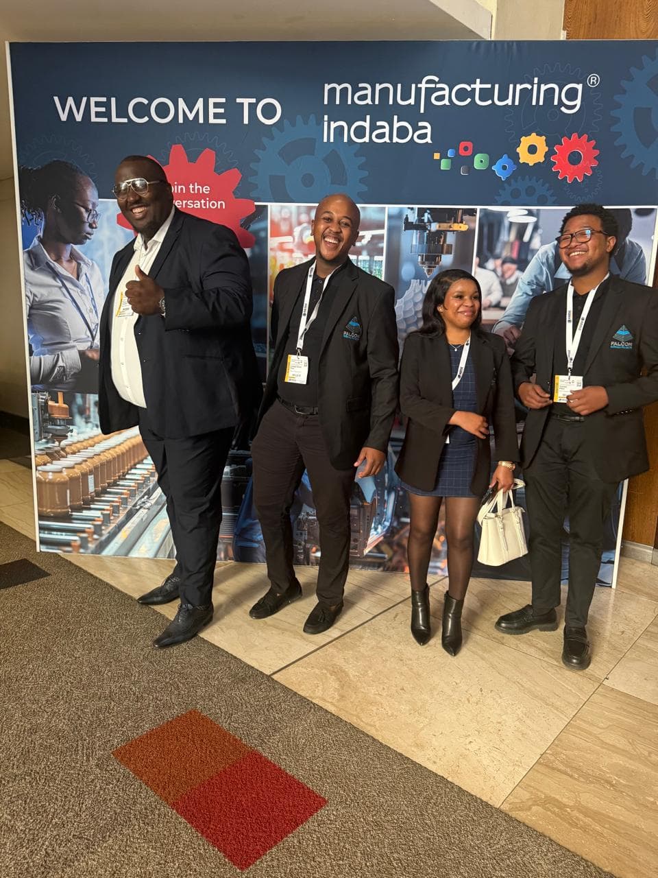 Falcon Emerald representatives at a manufacturing industry event display