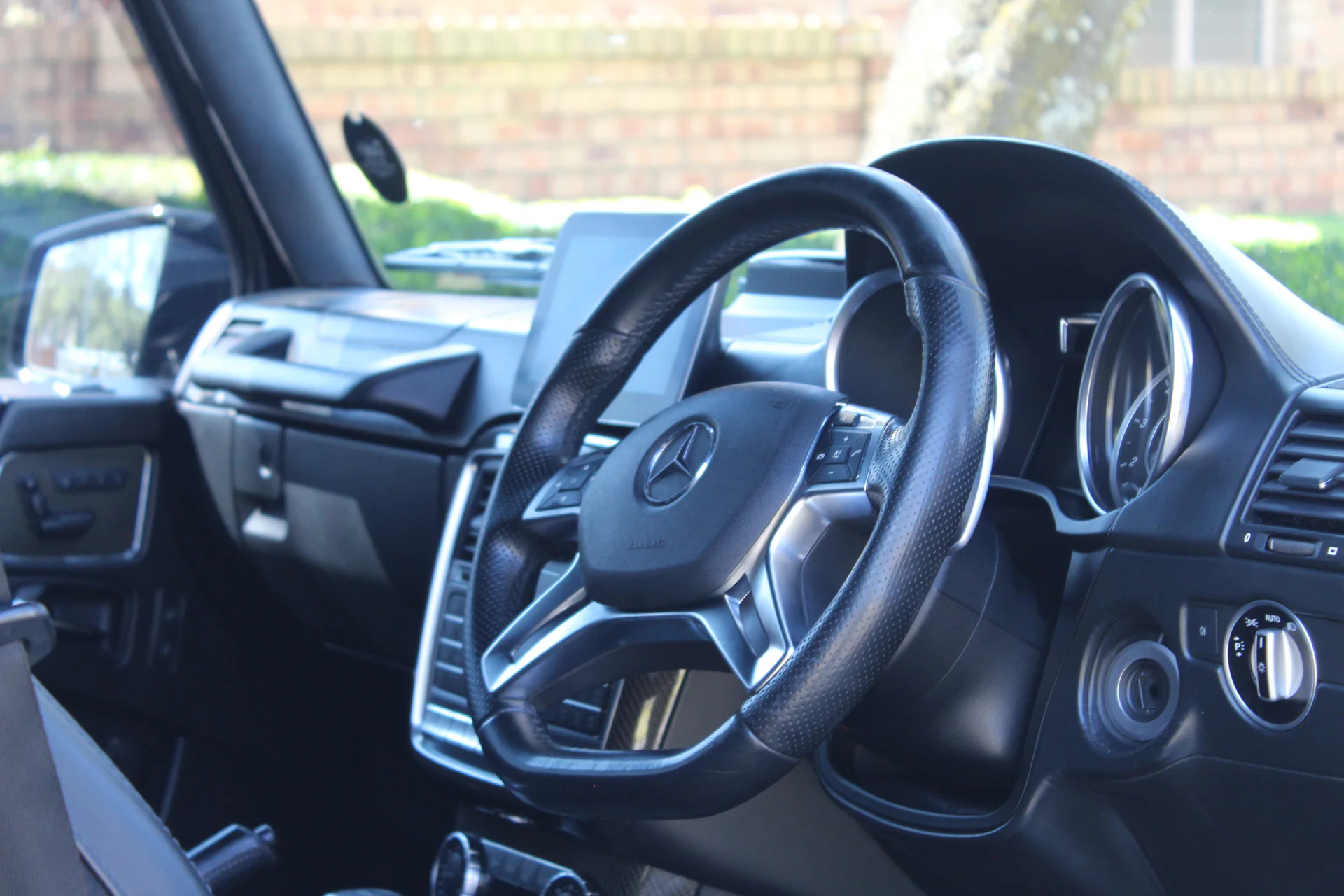 Mercedes G-Wagon steering wheel and driver cabin detail