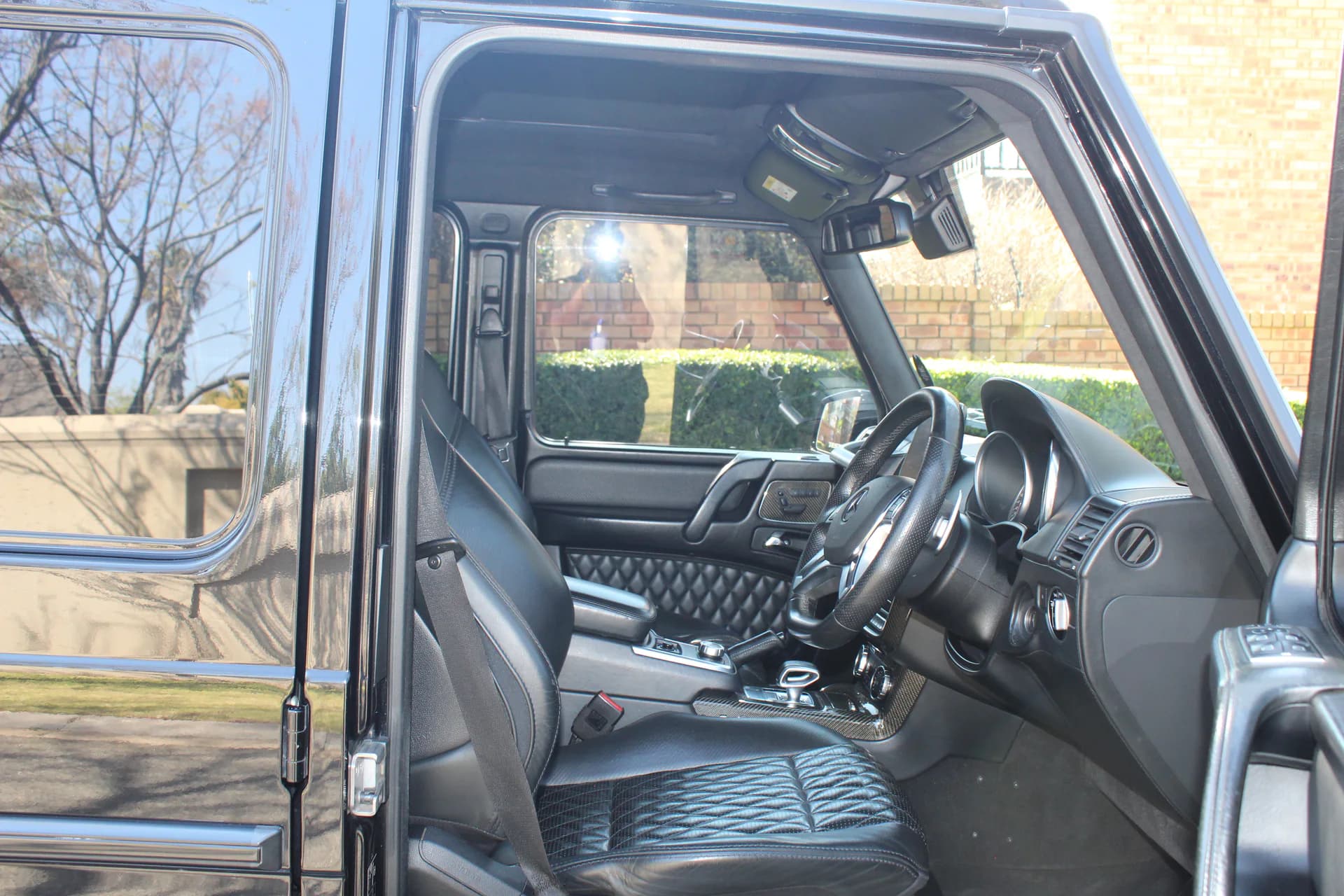 Mercedes G-Wagon front cabin viewed through the open door